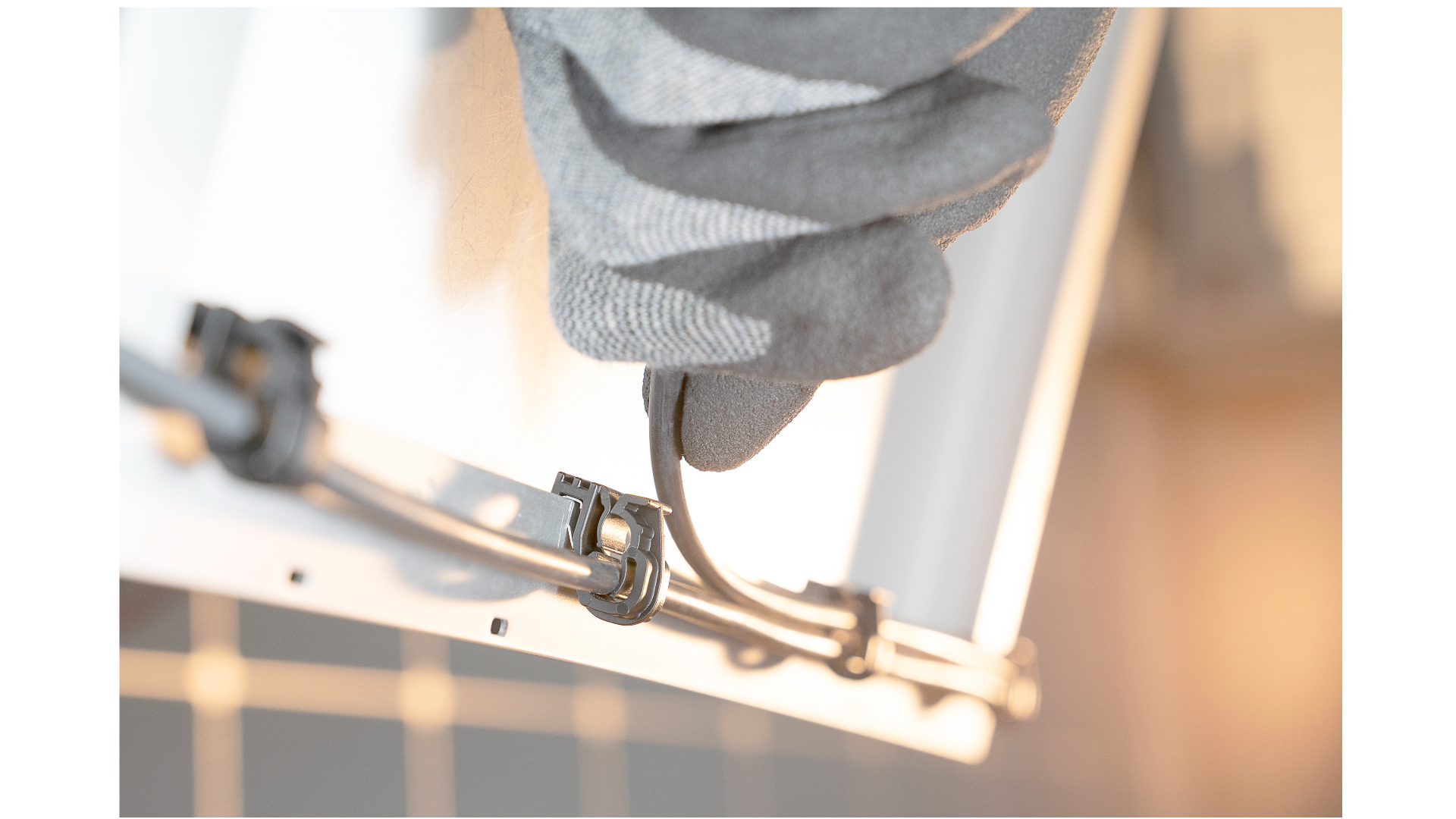 Edge clips for solar panel cables