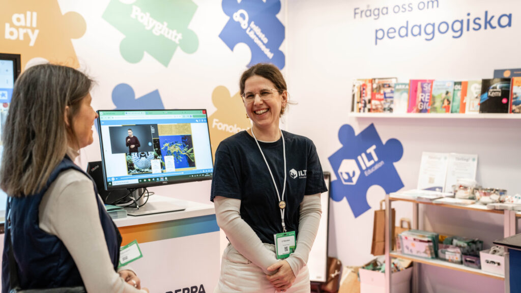 Glad utställare i monter