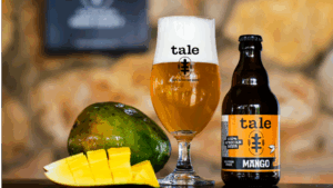 Tale Mango Fruit Beer 3.3% – brewed in Ghana using local ingredients, sweet, juicy and bursting with bold, natural flavour – glutenfree, sustainable, over 70% broken rice and fonio