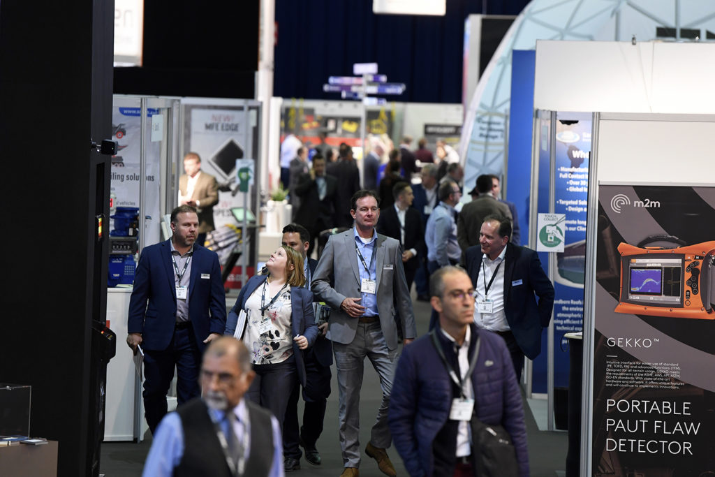 An image on the StocExpo event floor where people are walking