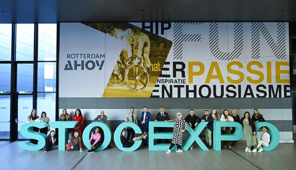 easyfairs employees stood by the stocexpo sign