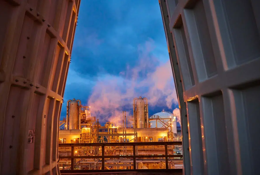 Terminal at night with lights and smoke