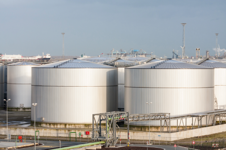 Silver tanks with clear blue sky