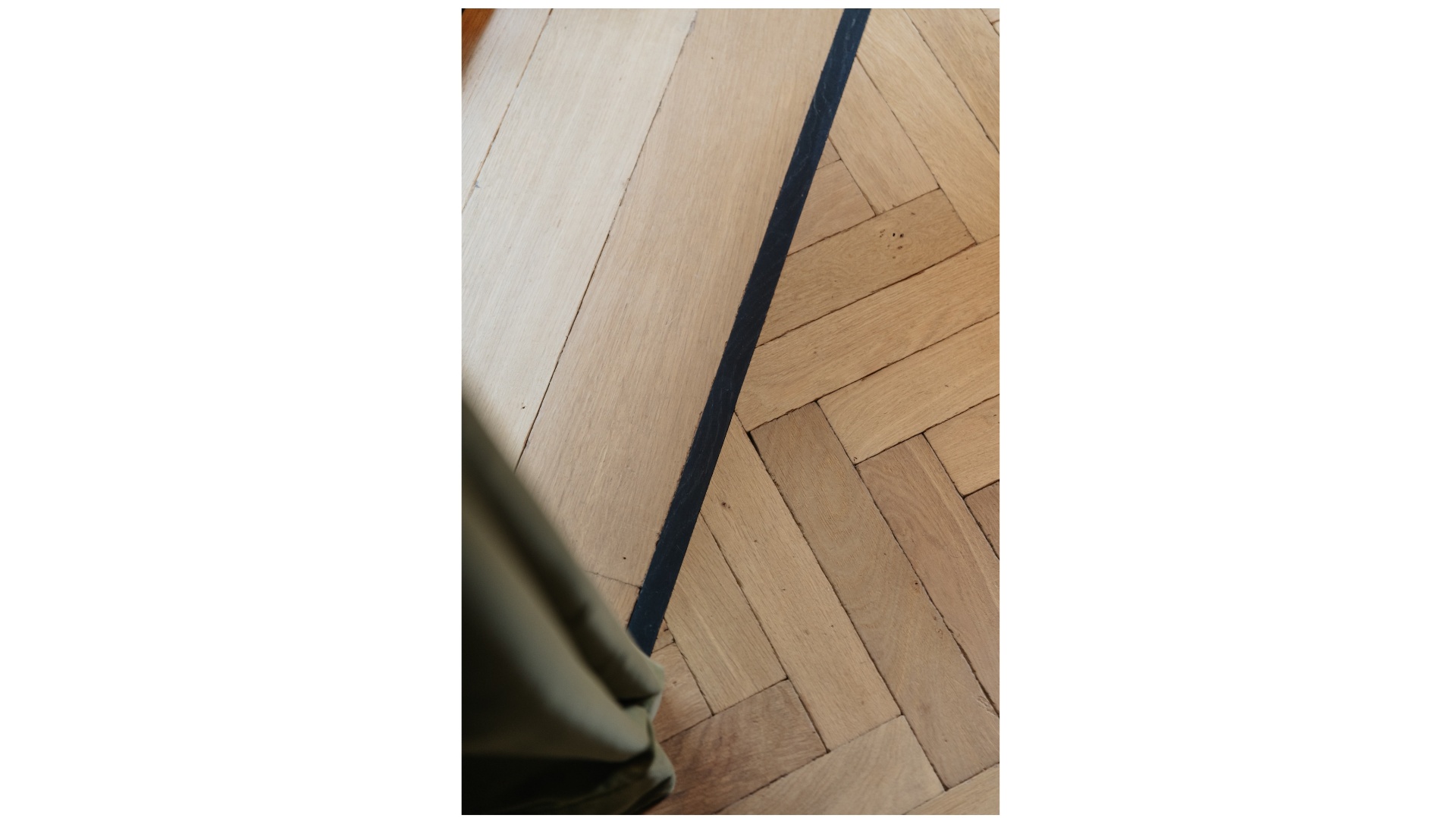 Massief visgraatparket met boorden