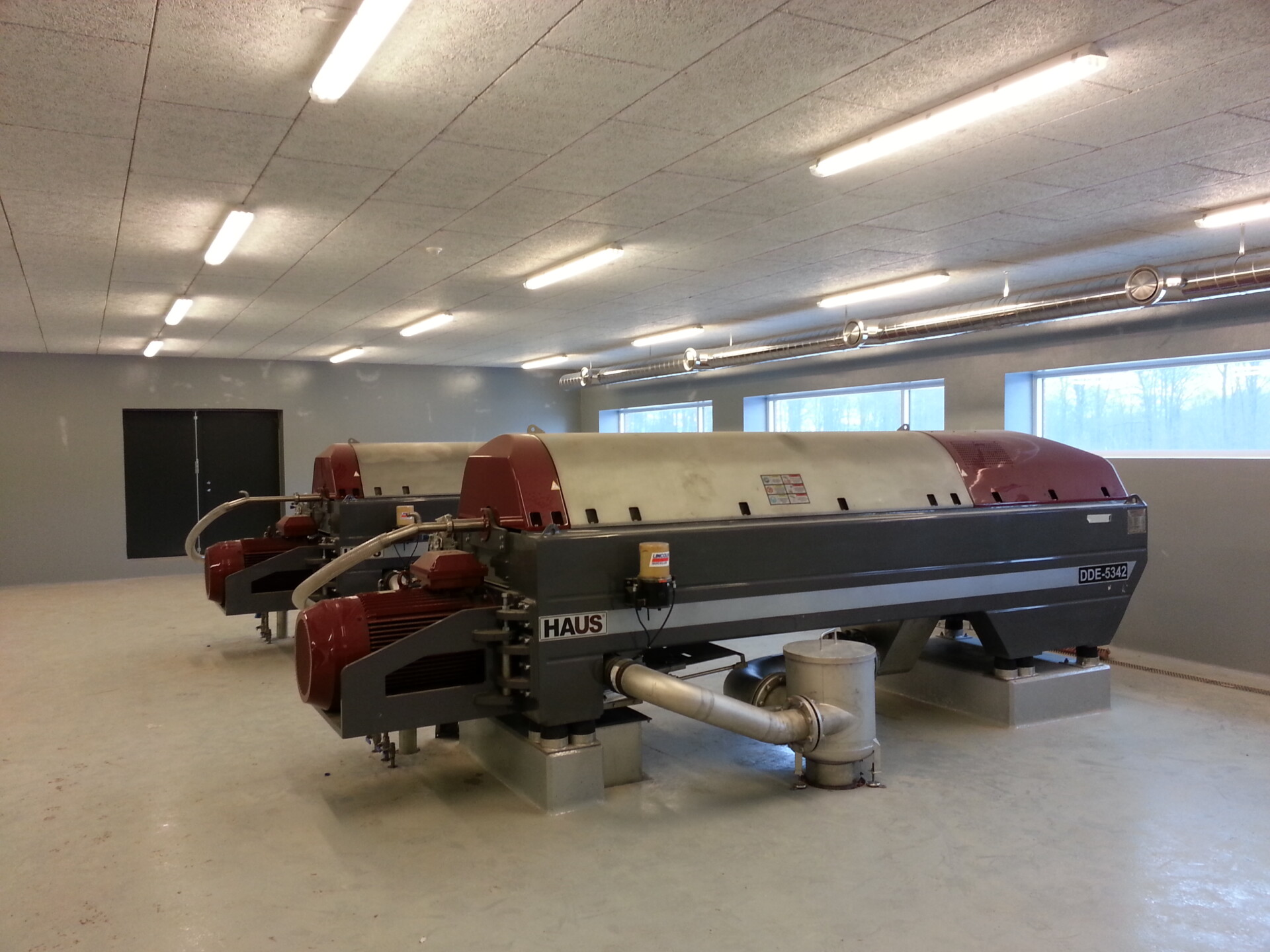 Decanter centrifuges for sludge thickening and dewatering