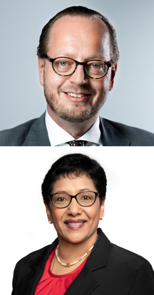 Man and woman smiling.