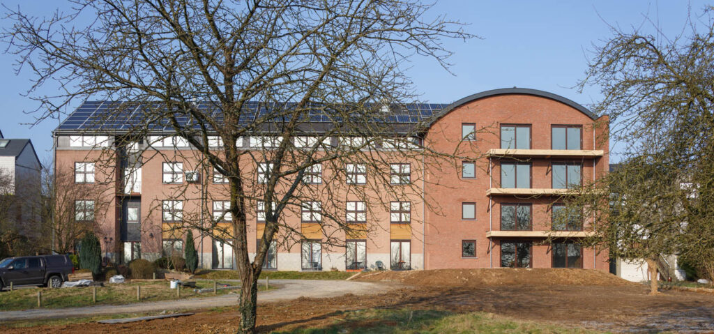 Résidence-service de 11 appartements et communs en bois