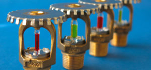Water spray extinguishing systems