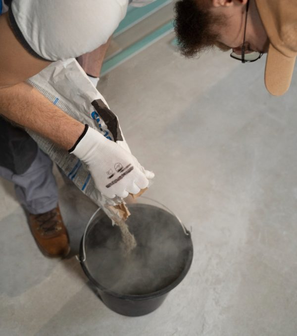 Man die gietvloer legt