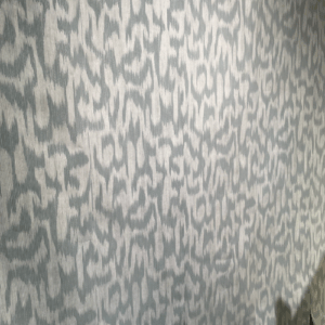Grijs-wit abstract patroon op textiel