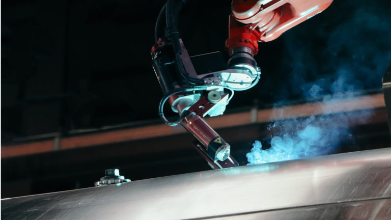 Robotic welding of aluminum tank containers