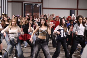 People dancing to K songs in the K-pop Heroes area at Heroes Made in Asia