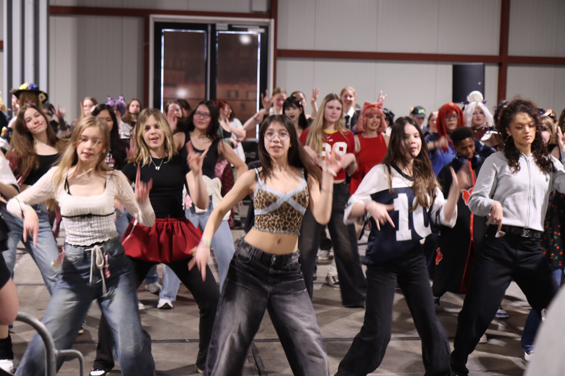 People dancing to K songs in the K-pop Heroes area at Heroes Made in Asia