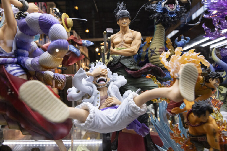 Anime action figures in dynamic battle display