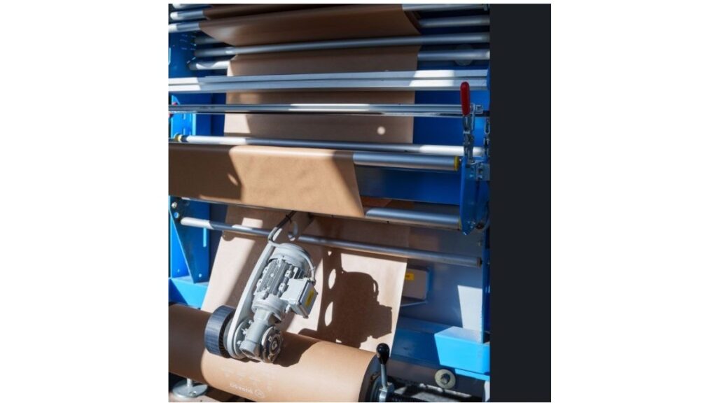 Packaging machine whit paper wrapping