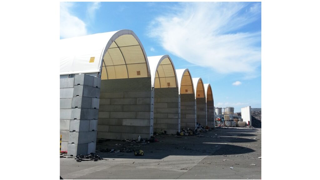 Effectively reduce emissions with textile hall systems