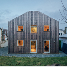Studio Bark retrofits victorian-era 'meadow house' with cork and timber extension