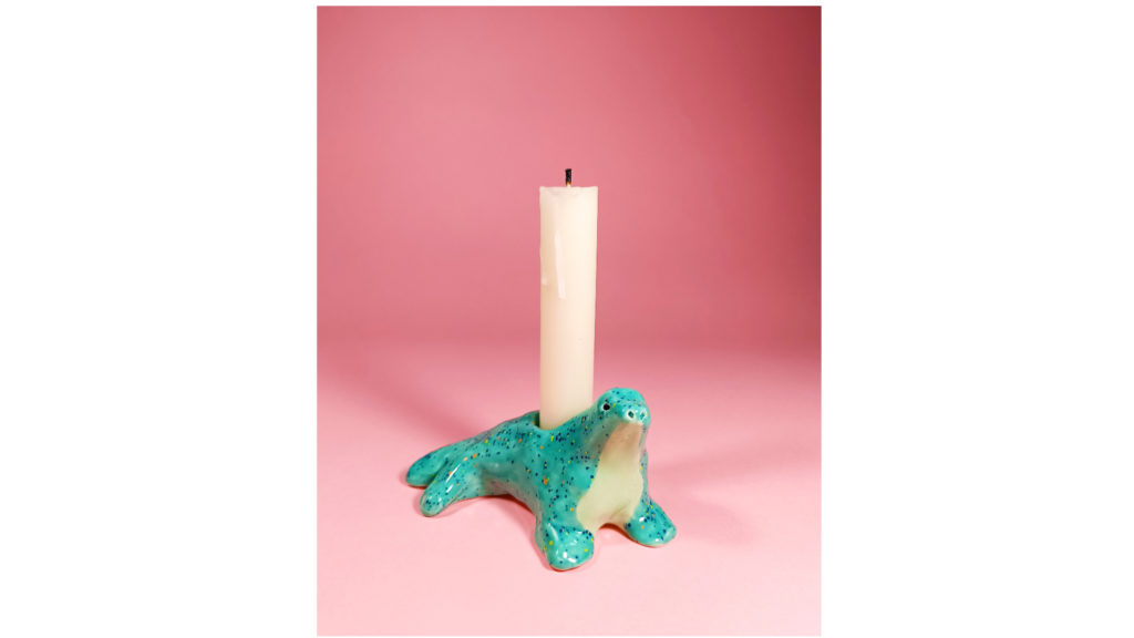 Seal candle stick holder