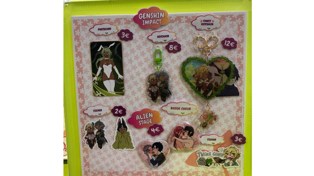 Genshin Impact stickers + keychains; Alien Stage pins + sticker