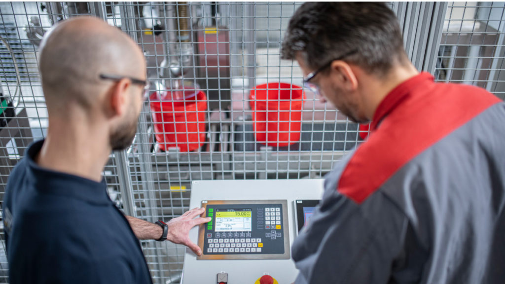 New: Automated bucket filling line with SysTec weighing electronics