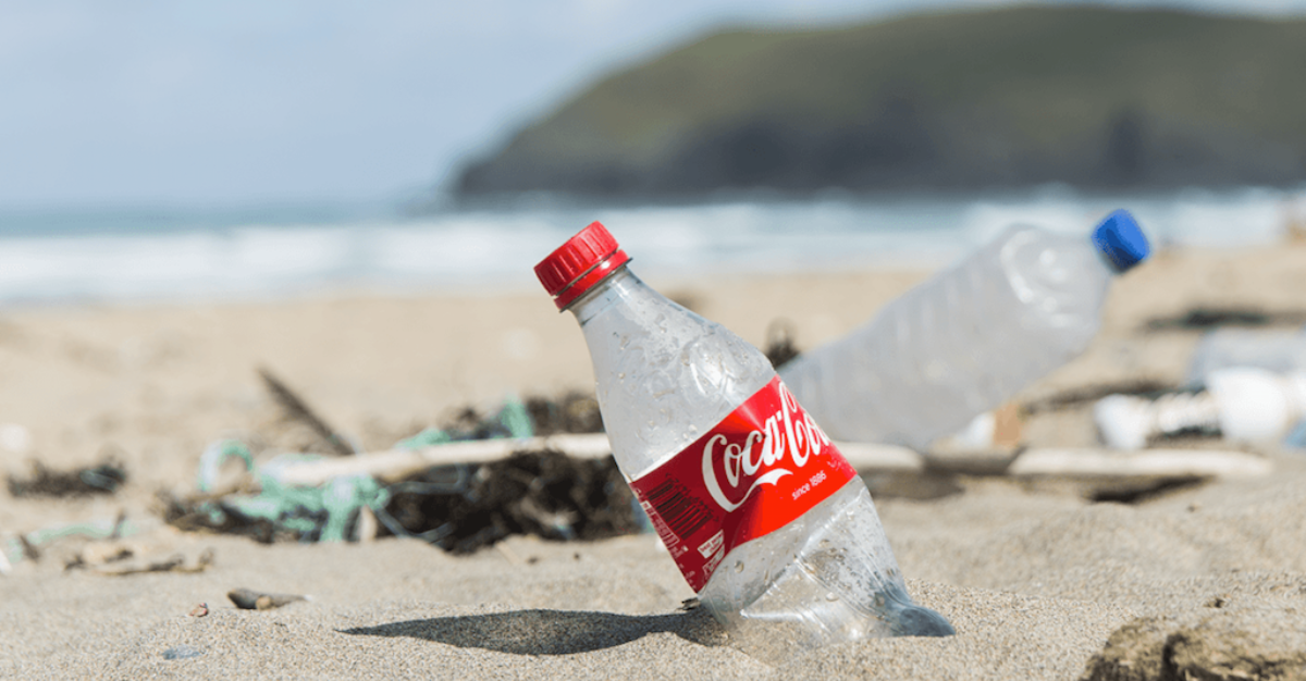 Coca-Cola bottle on beach