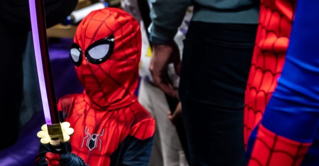 child dressed as Spiderman