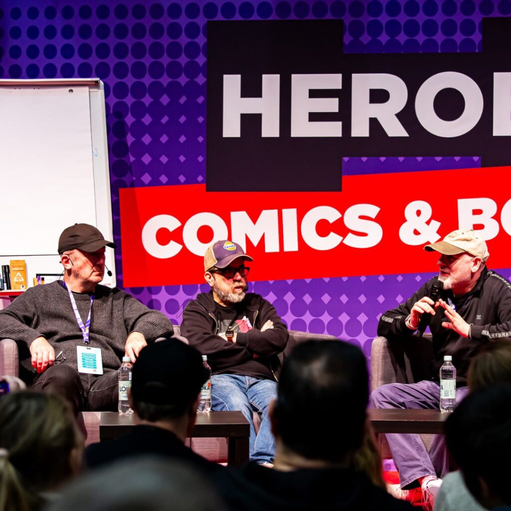 Comic artists talking on stage