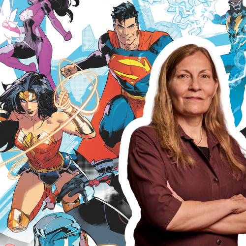 Editor in chief Marie Javins in front of a book she helped edit.