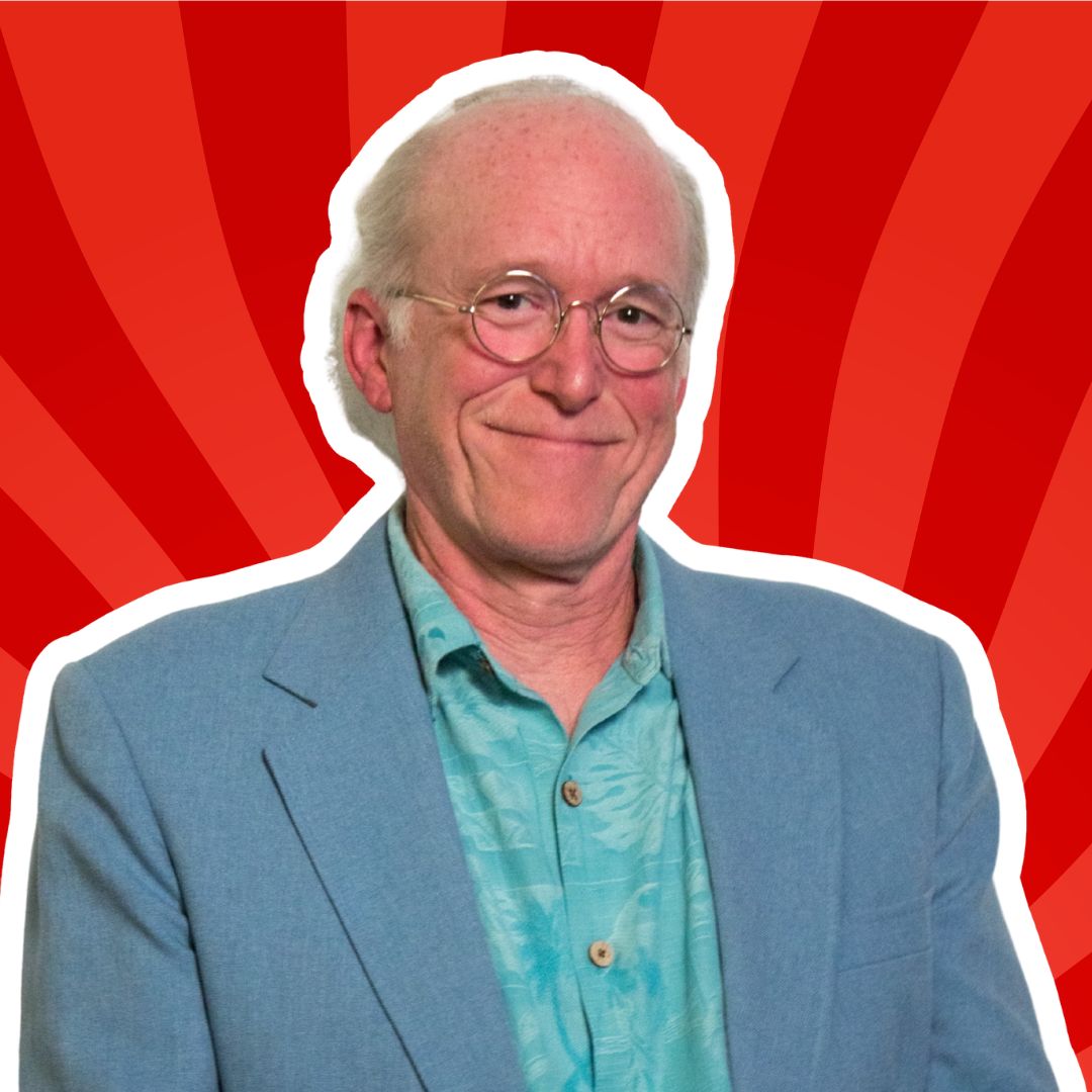 Portrait of Don Rosa in front of a red background.