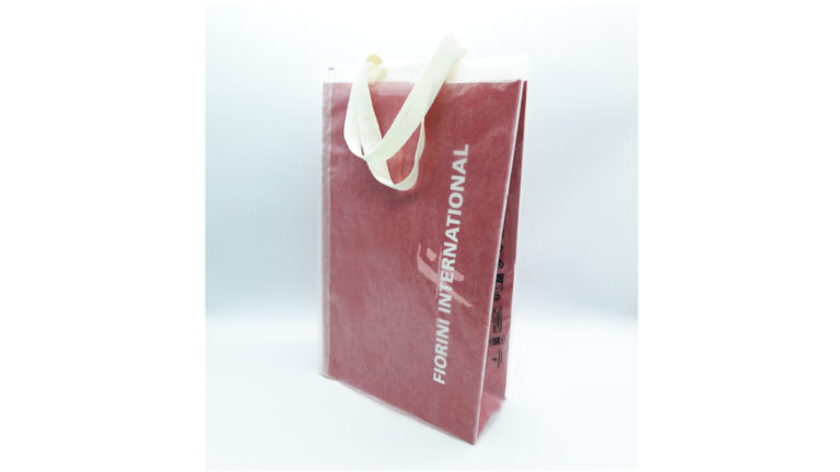 A paper rain cover for shopping bags