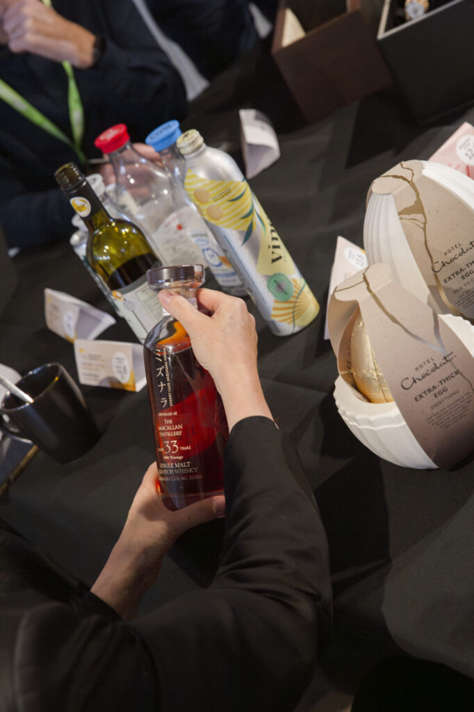 London Packaging Week Innovation Awards Judges looking at a product