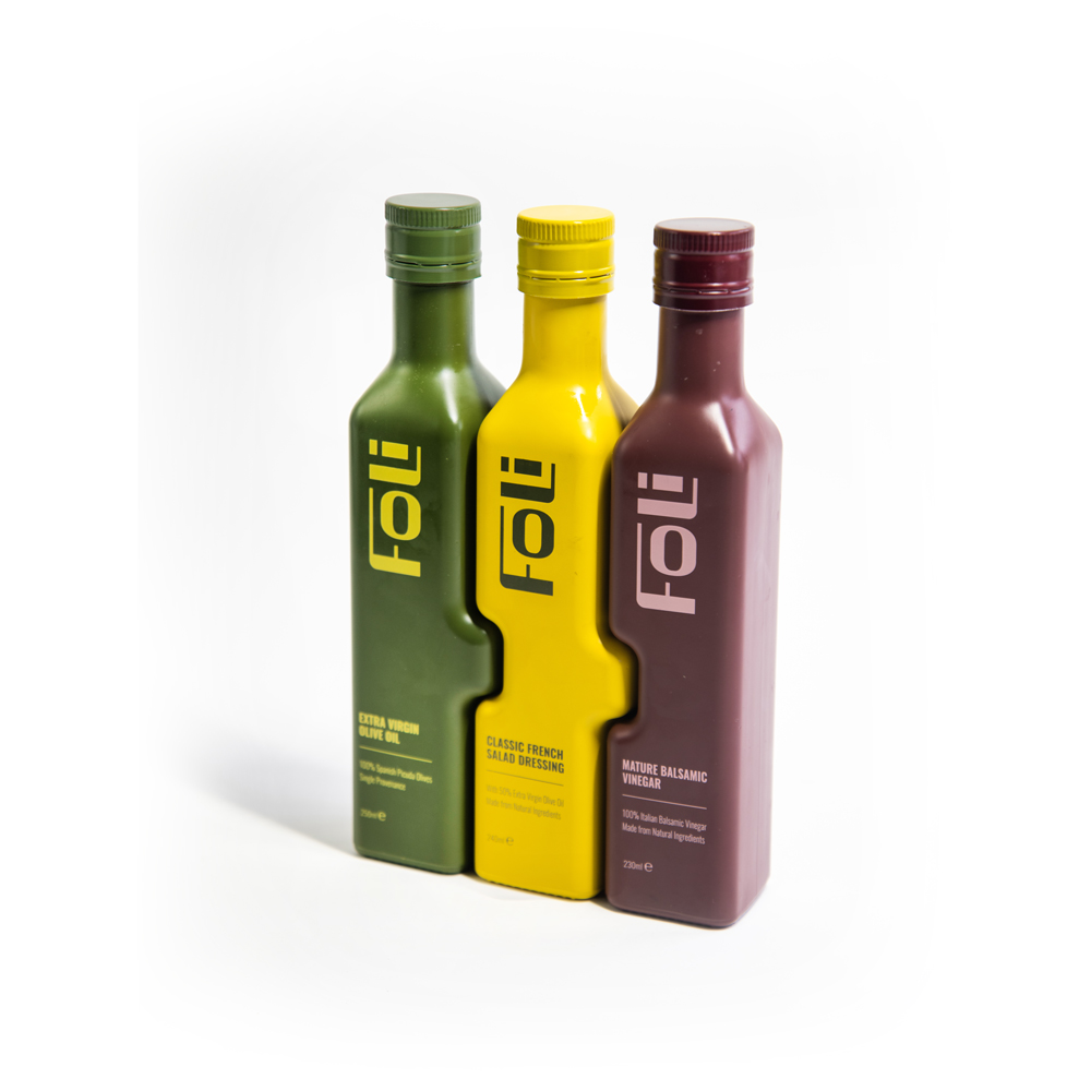 FOLI Extra Virgin Olive Oil, Classic French Salad Dressing and Mature Balsamic Vinegar in the brand’s interlocking glass bottles.